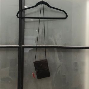 Small brown leather bag from Italy